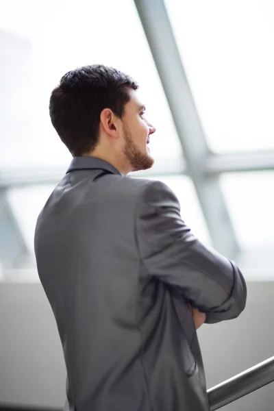 Portrait of a handsome business man in the office — Stock Photo, Image