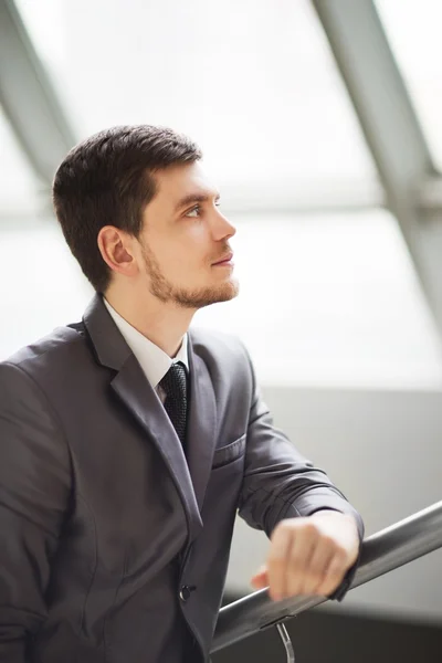 Portrait of a handsome business man in the office — Stock Photo, Image