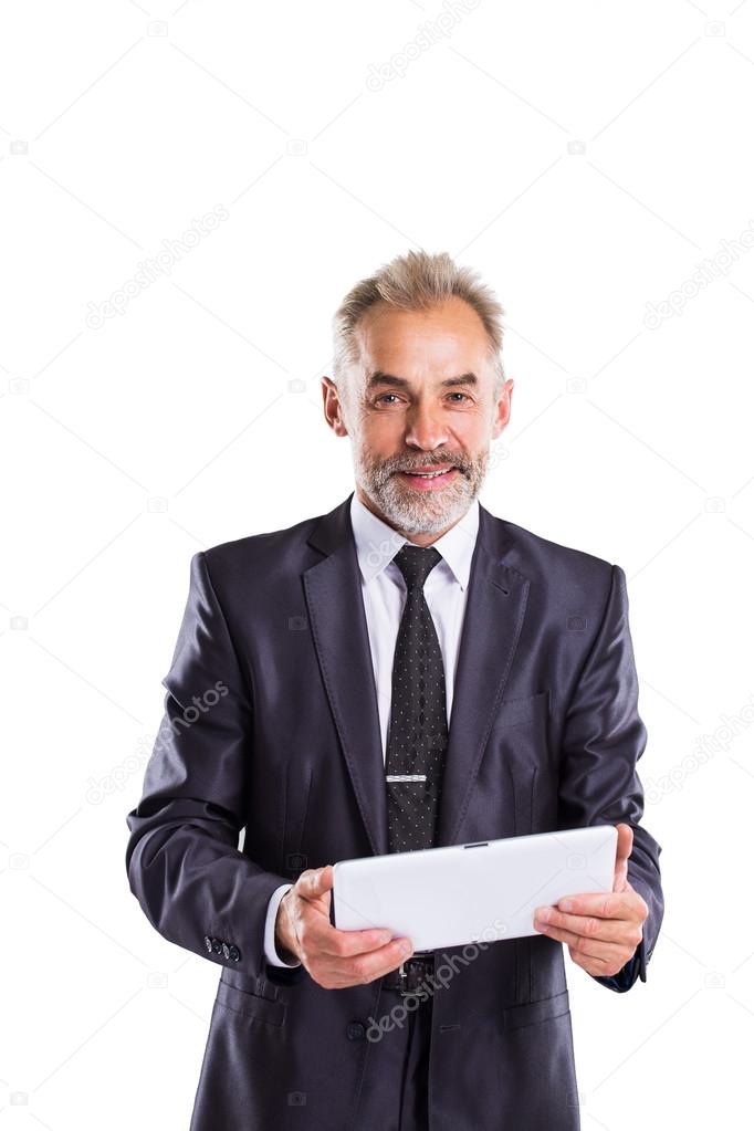 Confident businessman isolated on white background.