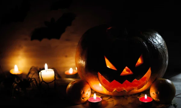 Halloween pumpkin head jack lantern on wooden background — Stock Photo, Image