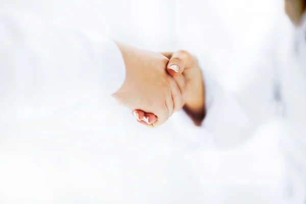 Photo of handshake of business partners after signing promising — Stock Photo, Image