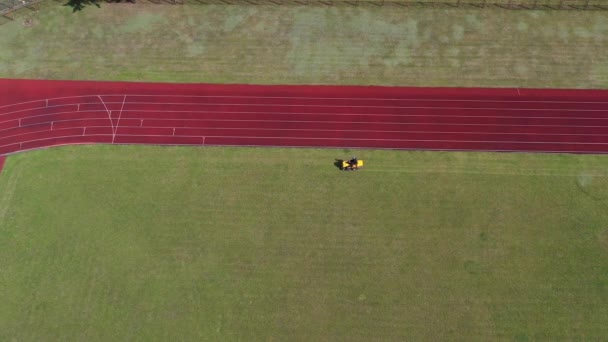 Lawn Mower Cutting Grass Football Soccer Field Aerial View — Stock Video