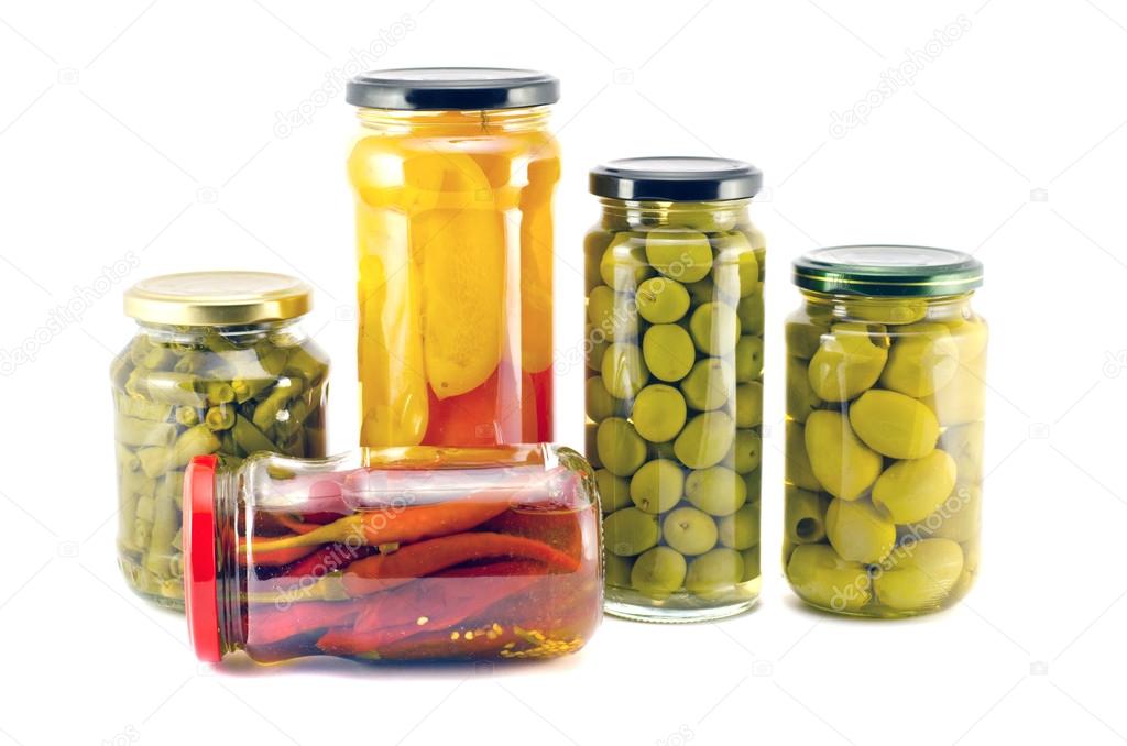 potted pepper, olive and asparagus food in glass pot isolated