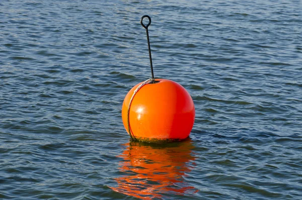 Orange buoy in  sea — Stock Photo, Image