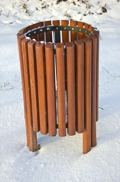 Wooden new rubbish bin box on snow — Stock Photo, Image