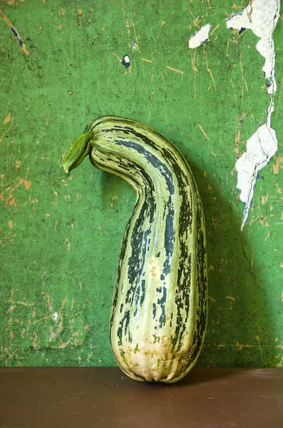 Green courgette zucchini on table — Stock Photo, Image