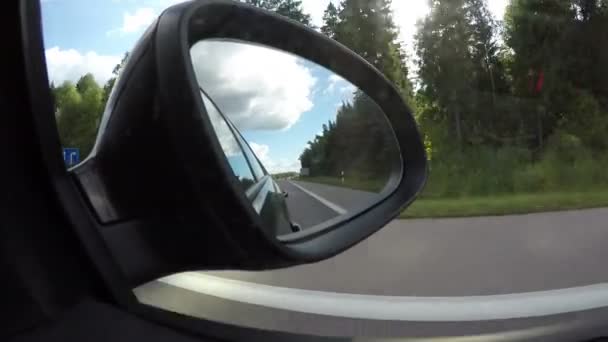 Carretera filmada desde el interior del coche en marcha, 4K — Vídeo de stock