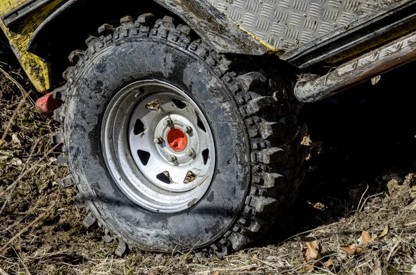 Off-road tire in mud — Stock Photo, Image