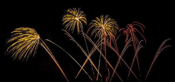 Colorful fireworks over night sky — Stock Photo, Image