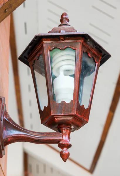 Wooden lantern with modern blub — Stock Photo, Image