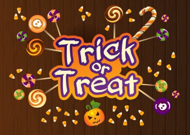 Happy Halloween Trick or Treat Greeting Card With Sweets on Old Web Wood Background clipart