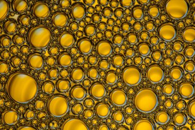 Golden drops and bubbles background