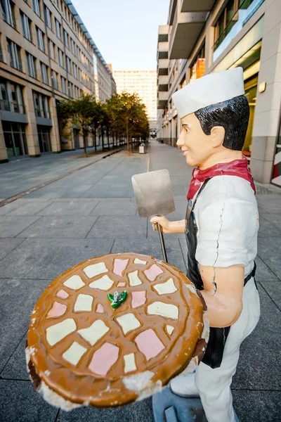 Berlin - Germany - September 27 :Funny commercial pizzaman statue made of plastic is located in the center of Berlin city  - Germany. — Stock Photo, Image