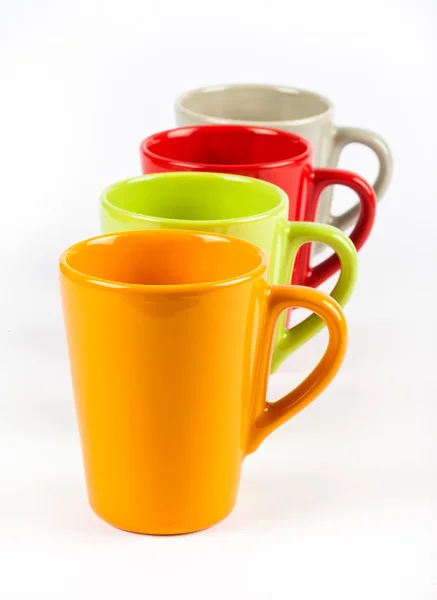 Quatre tasses à thé de couleur illustrées en ligne — Photo