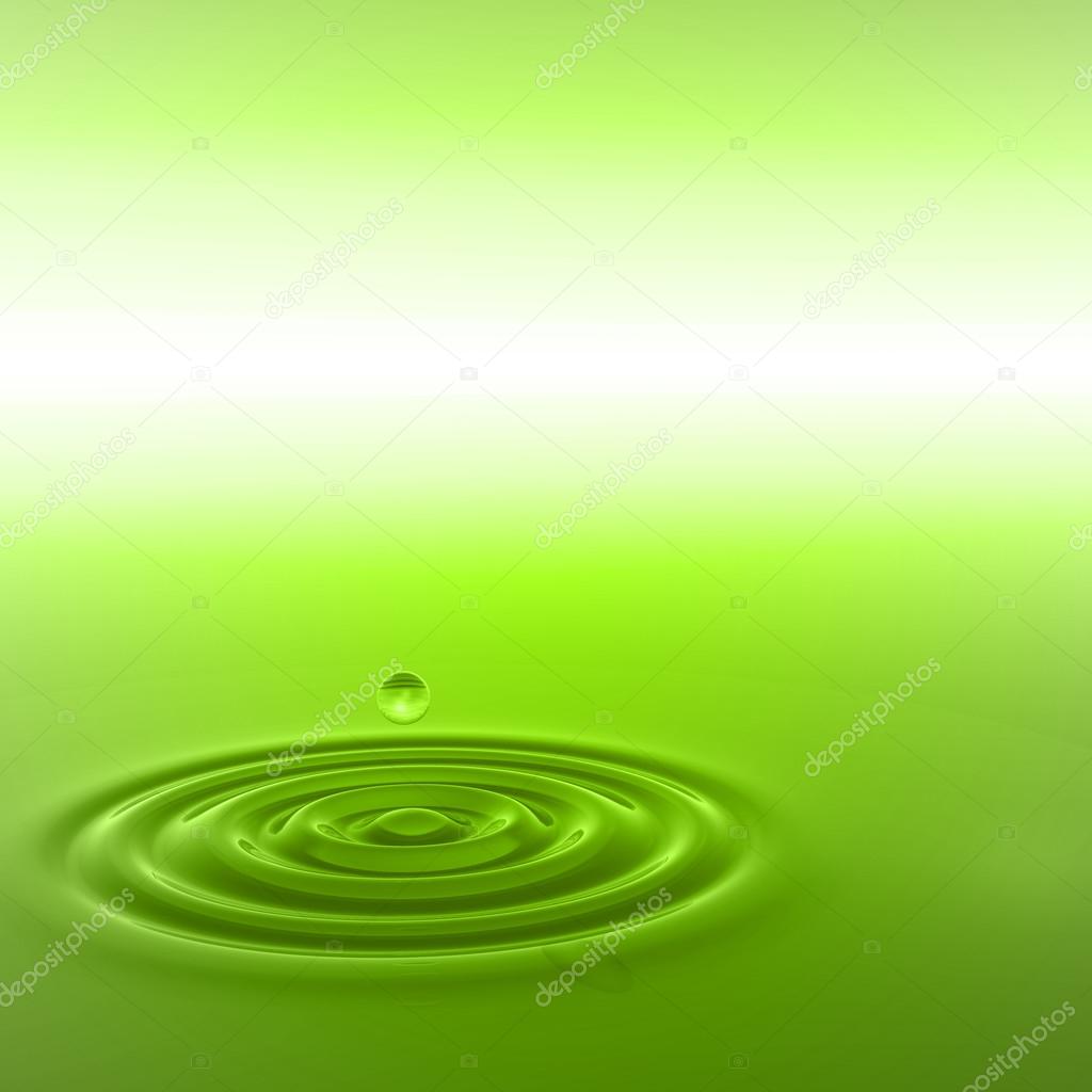 drop falling in water with ripples