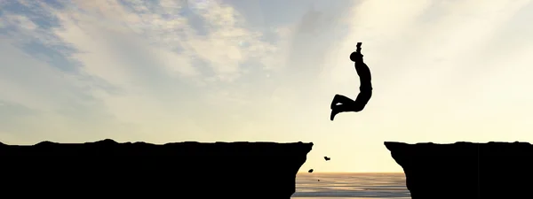 Young man silhouette jumping — Stock Photo, Image