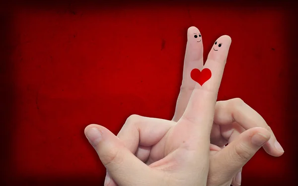 Dedos e um coração pintado — Fotografia de Stock