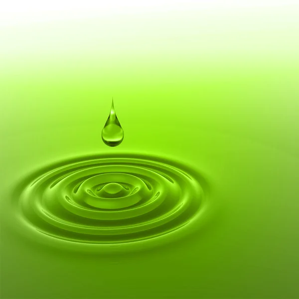 Green liquid drop falling — Stock Photo, Image