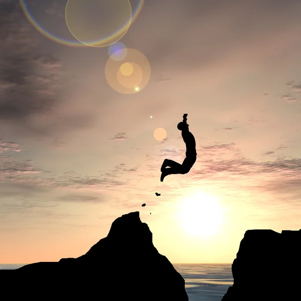 Jovem homem silhueta salto — Fotografia de Stock