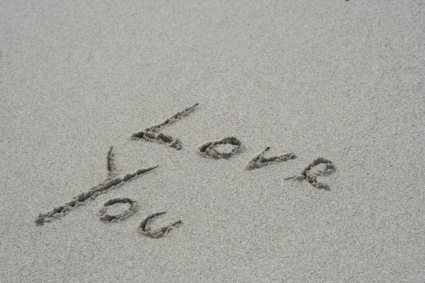 Love you text in sand — Stock Photo, Image