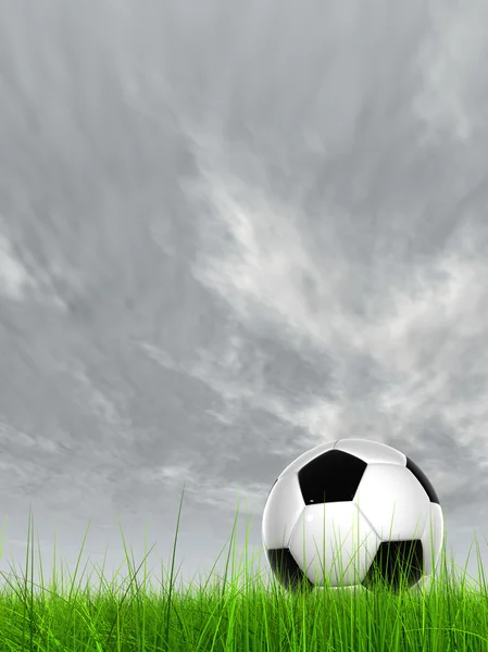 Fotboll i färskt grönt gräs — Stockfoto