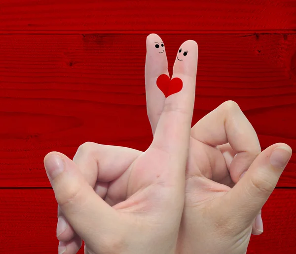 Fingers with a heart painted — Stock Photo, Image