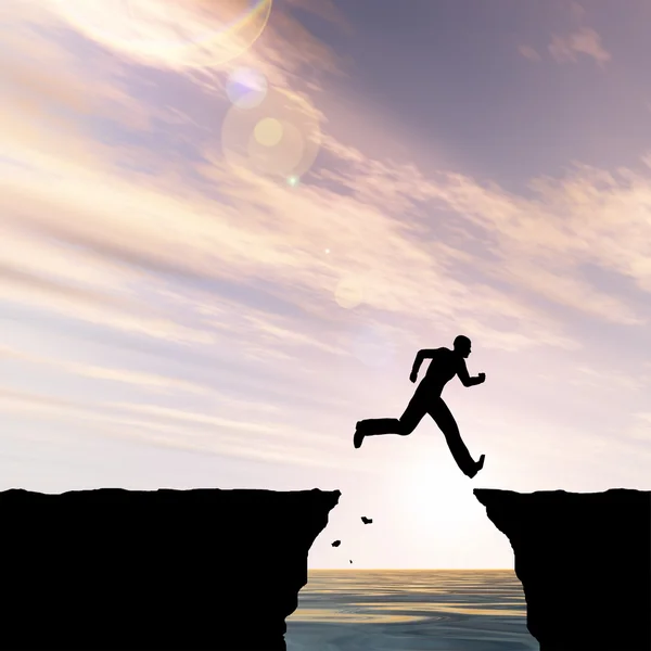 Businessman silhouette jumping from cliff — Stock Photo, Image