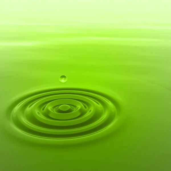 Drop falling in water — Stock Photo, Image