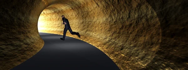 Zakenman in donkere wegtunnel — Stockfoto