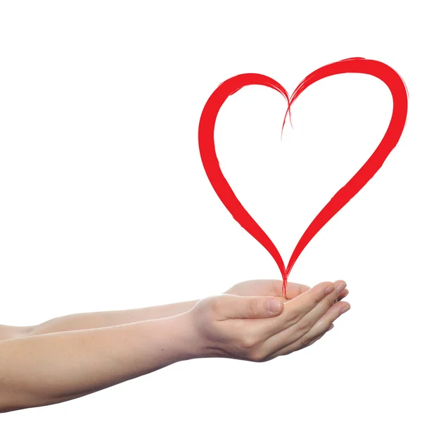 Hjärtat i mänskliga händer — Stockfoto
