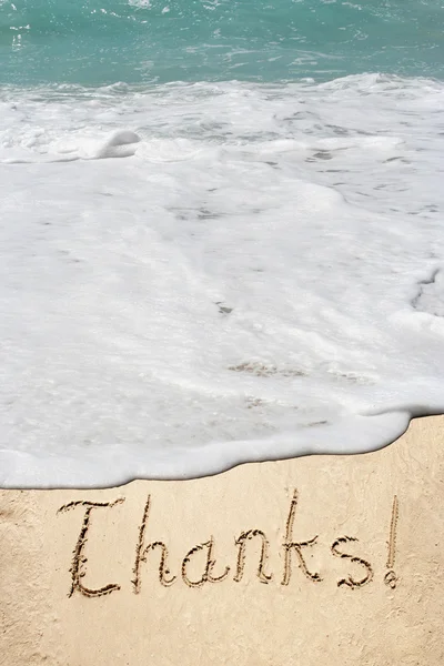 Thanks text carved in a golden sand — Stock Photo, Image