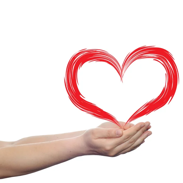 Hjärtat i mänskliga händer — Stockfoto
