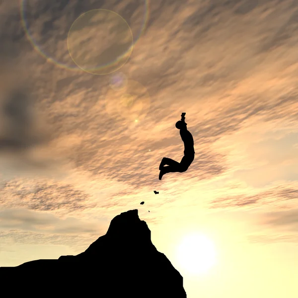 Man silhouette jumping  from cliff — Stock Photo, Image