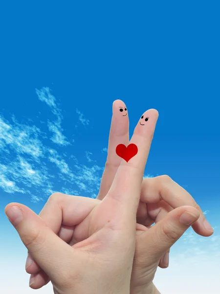 Fingers  with smiley faces and heart — Stock Photo, Image