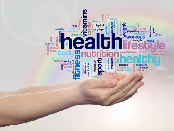 Health word cloud in hands — Stock Photo, Image