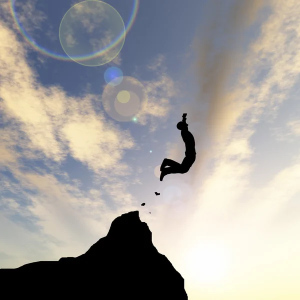 Man silhouette jumping  from cliff — Stock Photo, Image
