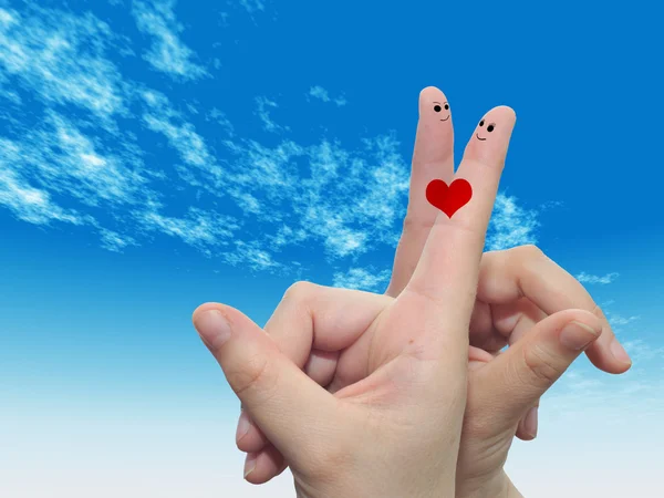 Fingers  with smiley faces and heart — Stock Photo, Image