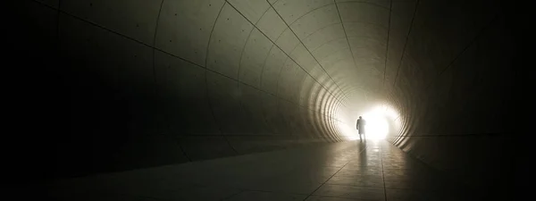 Concept or conceptual dark tunnel with a bright light at the end or exit as metaphor to success, faith, future or hope, a black silhouette of walking man to new opportunity or freedom 3d illustration