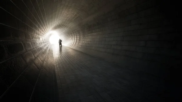 Concept or conceptual dark tunnel with a bright light at the end or exit as metaphor to success, faith, future or hope, a black silhouette of walking man to new opportunity or freedom 3d illustration