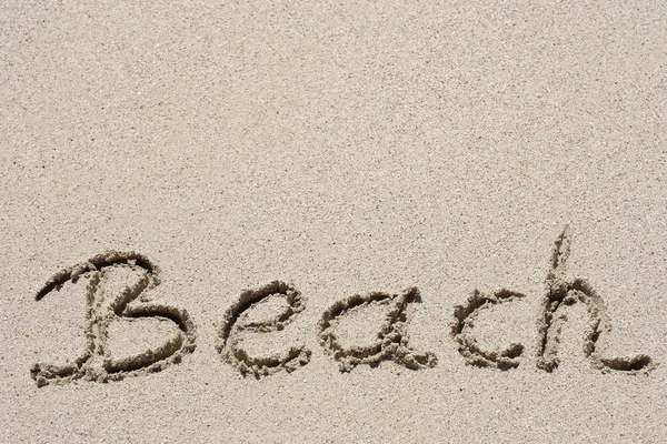 Παραλία χειρόγραφη στην άμμο — Φωτογραφία Αρχείου