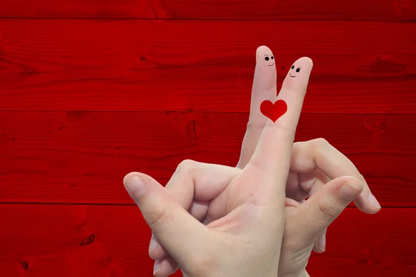Parmakları ile boyalı bir kalp — Stok fotoğraf
