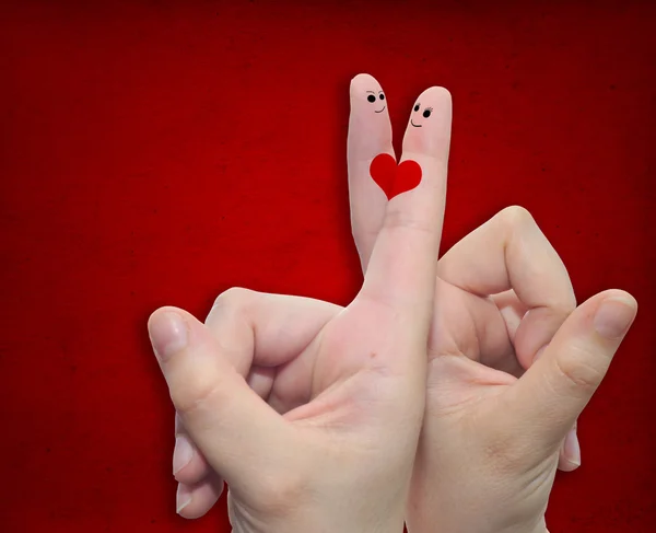 Dedos y un corazón pintado — Foto de Stock