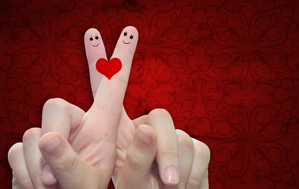 Fingers and a heart painted Stock Image