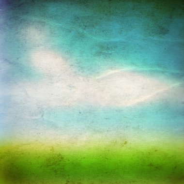 Bahar çim alanın üzerine mavi gökyüzü