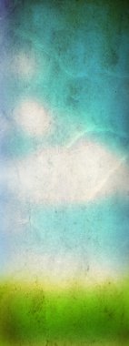 Bahar çim alanın üzerine mavi gökyüzü