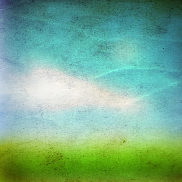 Весеннее травяное поле над небом — стоковое фото