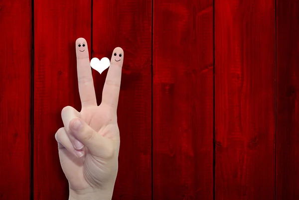 Fingers with a heart painted — Stock Photo, Image