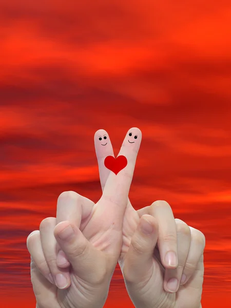 Prsty s červeným srdcem — Stock fotografie