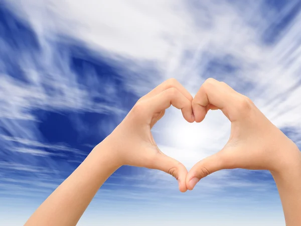 Heart over blue sky background — Stock Photo, Image