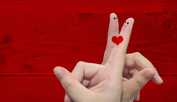 Parmakları ile boyalı bir kalp — Stok fotoğraf